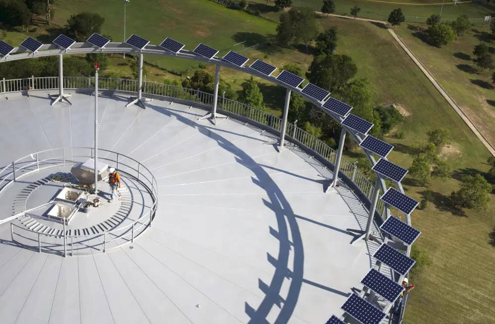 image of the industry's first 'green' elevated water storage tank featuring the solar panels located on top of the tank.