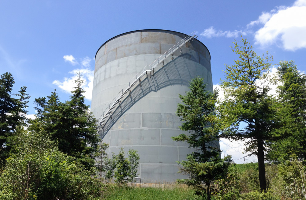 image of the staircase along the side of the wall of a chilled water thermal energy storage tank.