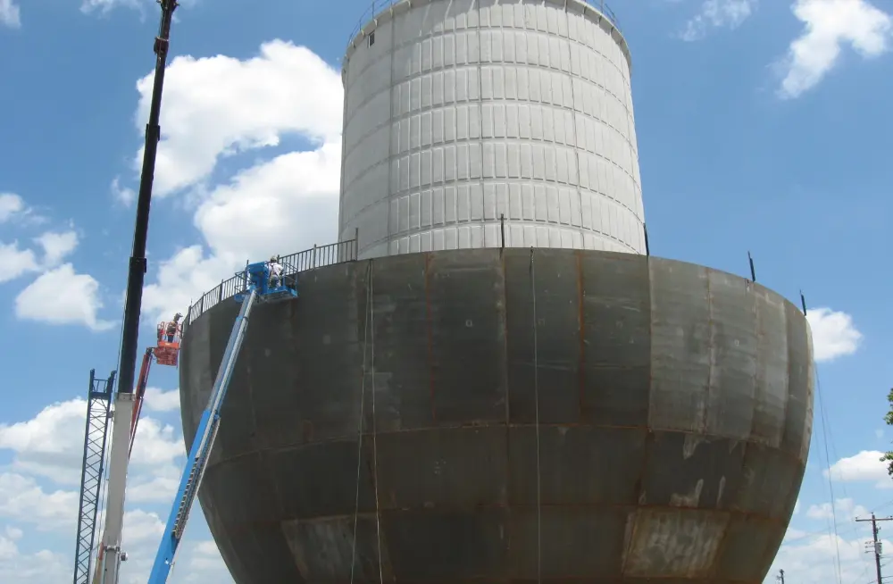 image of the construction of the industrys first 'green' elevated water storage tank.