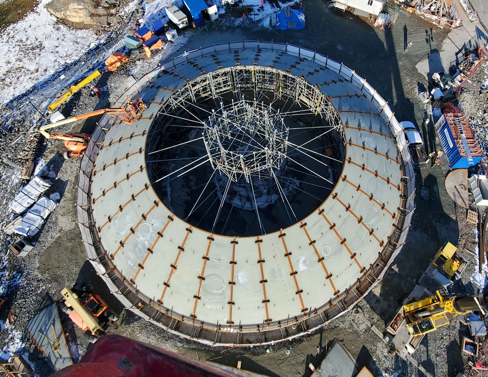 image of a water storage reservoir under construction in the process of placing the roof panels