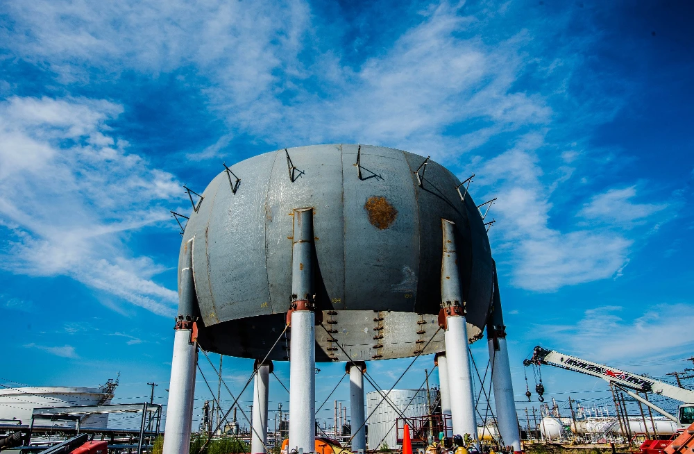 image of isobutane storage sphere under construction.