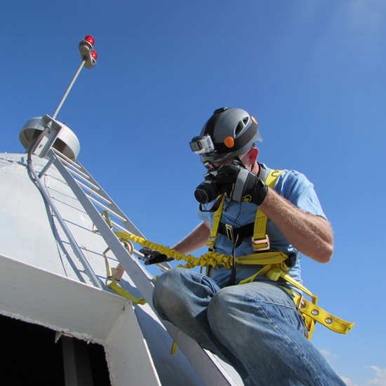 Inspection-square Worker with Gloves working on Structure